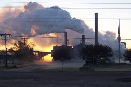 The sugar mill with smoke