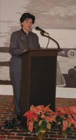 Woman speaking during the dedication